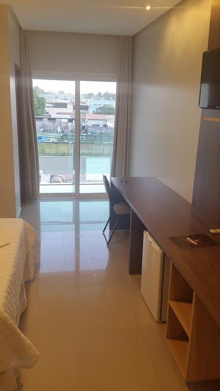 Kamur Plaza Hotel Goianesia Rum bild