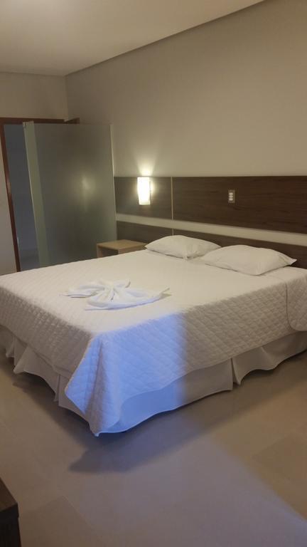 Kamur Plaza Hotel Goianesia Rum bild
